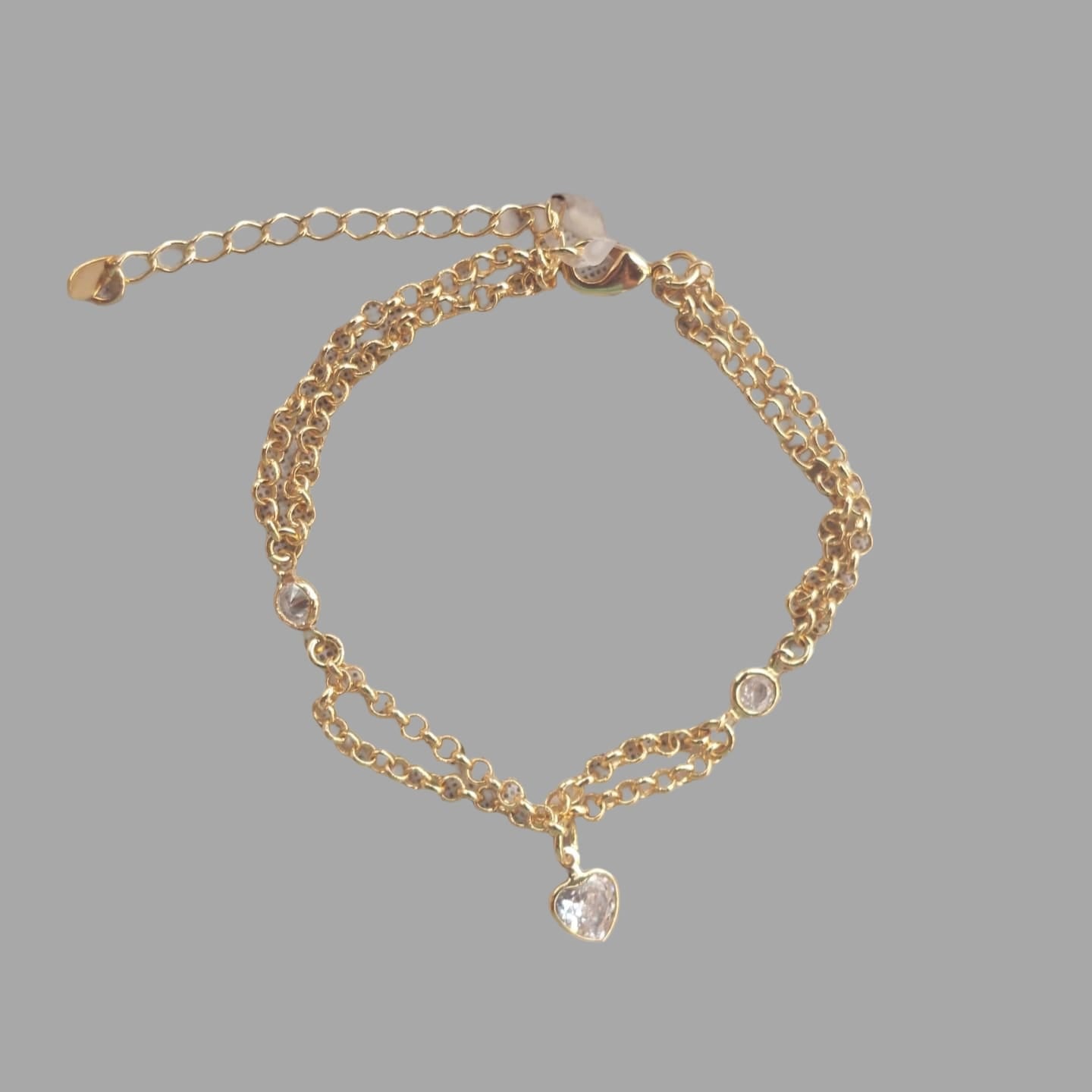 PULSEIRA DUPLA C/ 2 ZIRCS E 1 CORAÇÃO